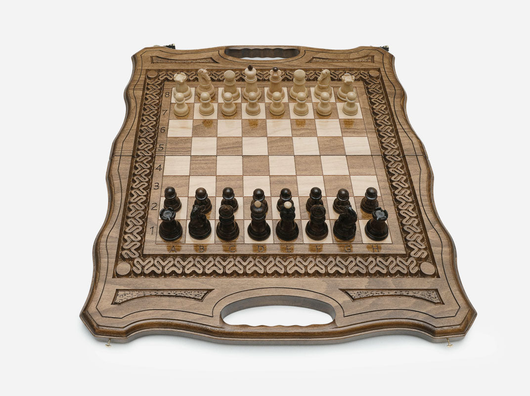 Detail of the beech and walnut Staunton chess pieces on the maple and walnut squares