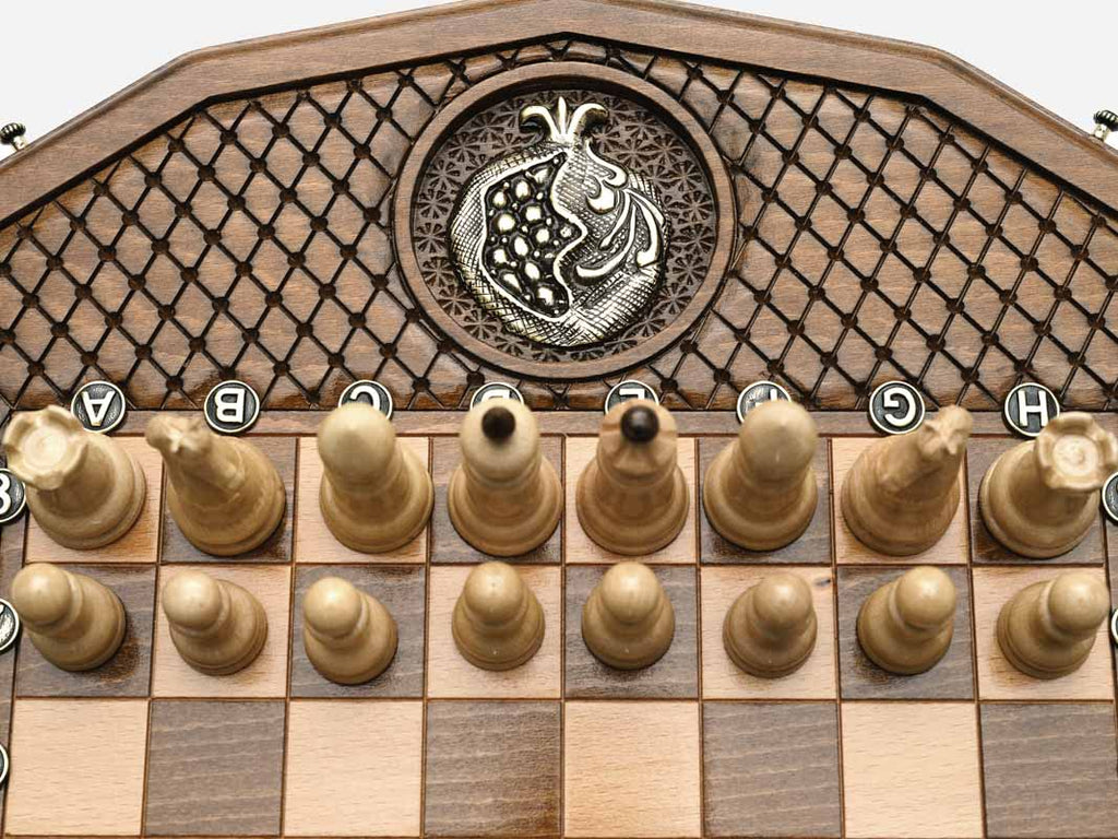 Pomegranate and Grapevine chess set shown folded