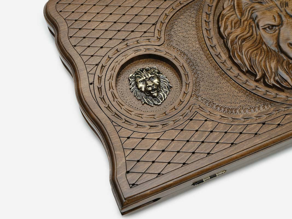 The backgammon board opened to show the wooden playing surface