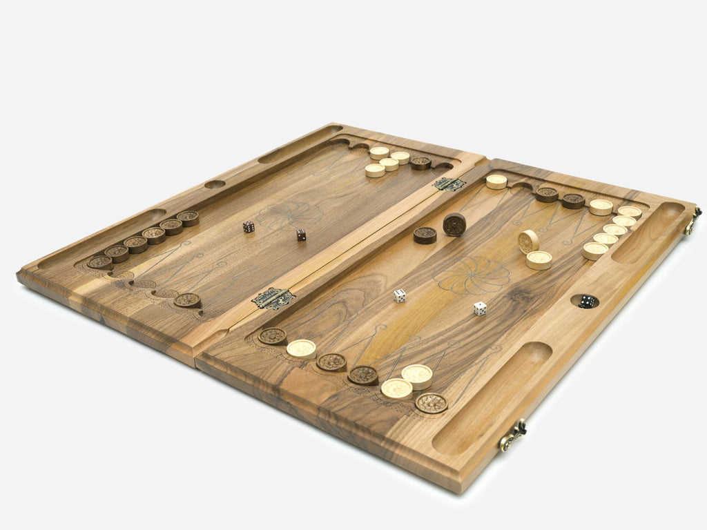 Angled view of the silver inlay ornament backgammon board