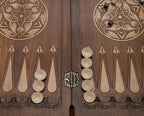 Close-up of the beechwood carving and bronze detail