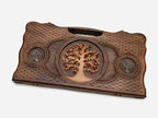 Angled view of the tree of life carved backgammon board