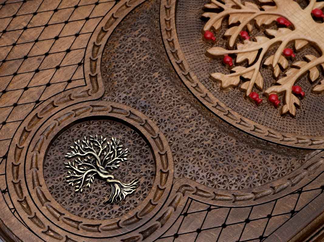 The backgammon board opened to show the wooden playing surface
