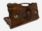 Carved beechwood backgammon board with the Armenian eternity symbol and bronze accents, propped open