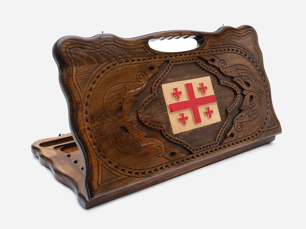 Carved beechwood backgammon board with the Georgian five-cross flag and a carry handle, propped open