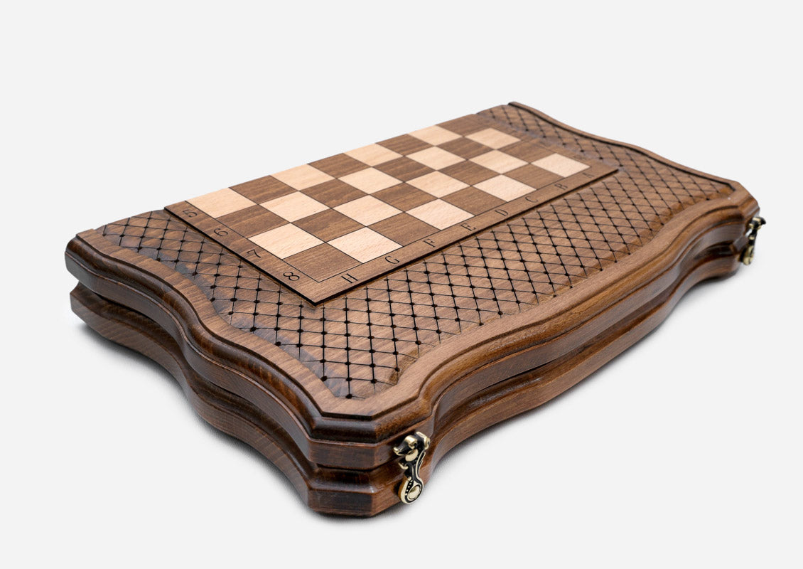 Handle chess board closed, side view showing the varnished wood finish and brass clasps