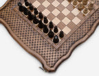 Close-up of the engraved board coordinates and dark walnut chess pieces