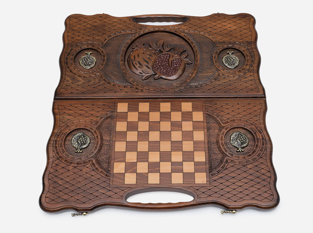 The backgammon board opened to show the wooden playing surface