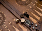 Close-up of the backgammon checkers, dice and cup on the Handle Rosette Ornament table