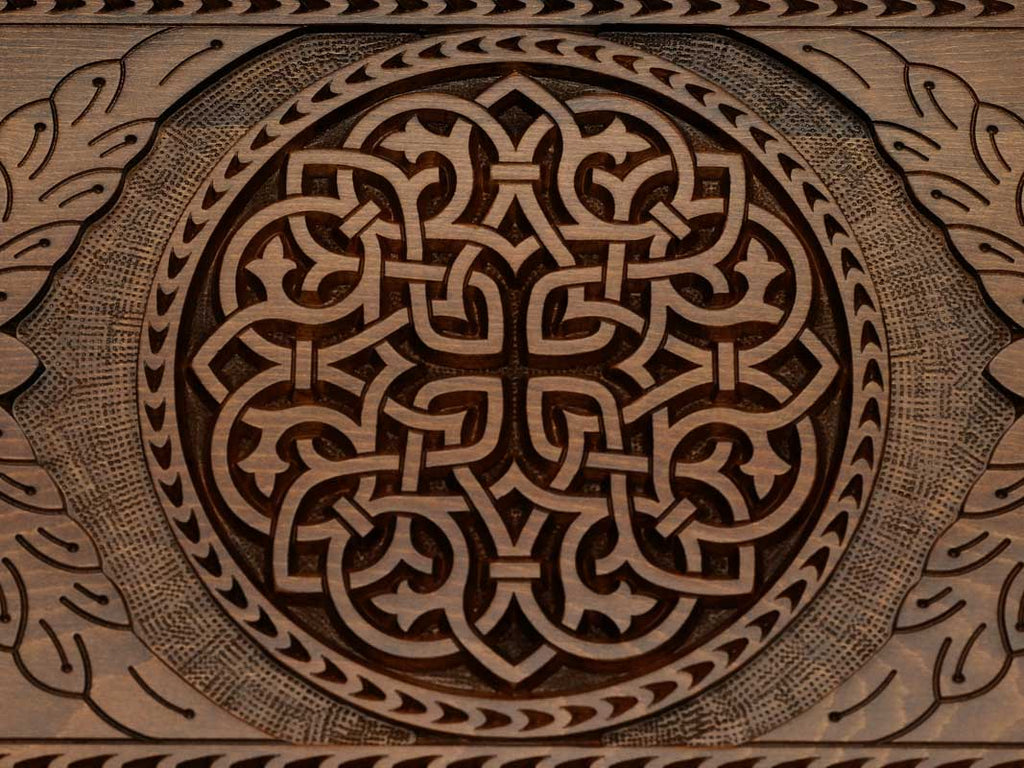 The backgammon board opened to show the wooden playing surface