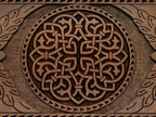The backgammon board opened to show the wooden playing surface