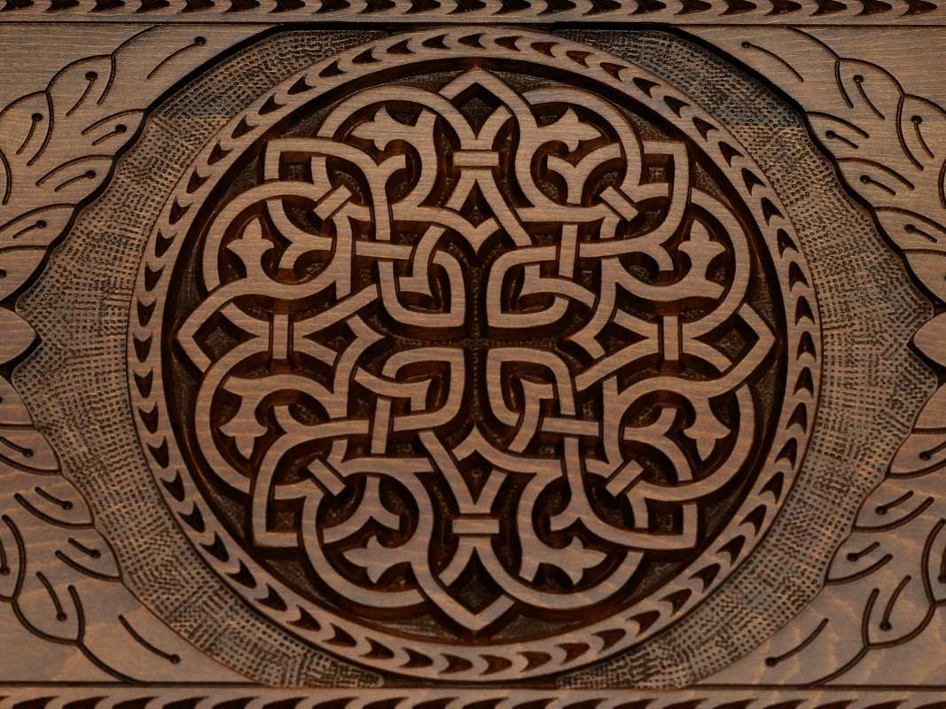The backgammon board opened to show the wooden playing surface