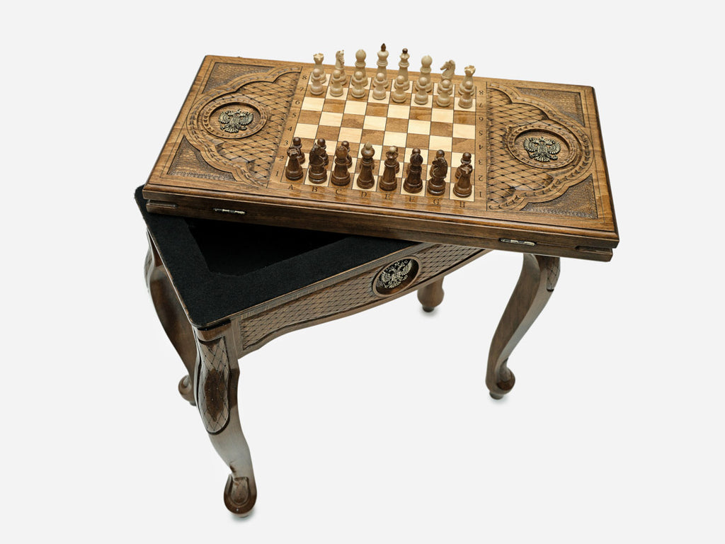 Close-up of the Handle Russian Coat of Arms table leg and drawer carving