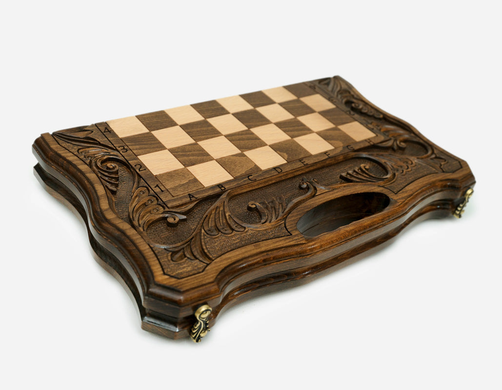 Detail of the beech and walnut chess pieces on the inlaid maple and walnut squares