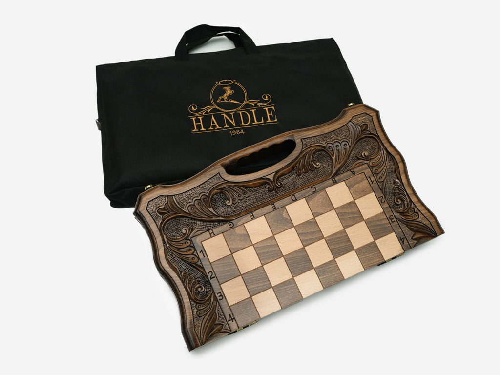 The carved folding chess set shown closed, ready to carry