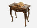 Handle Eagle chess and backgammon table set up for chess, angled view showing the carved eagle legs