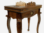 Close-up of the Handle Eagle table leg and drawer carving