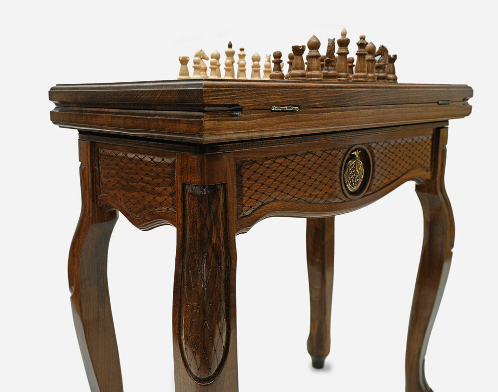 Close-up of the Handle Pomegranate table leg and drawer carving