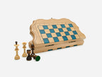 Compact folding chess board in pale wood with blue epoxy squares and wooden pieces, shown partly open