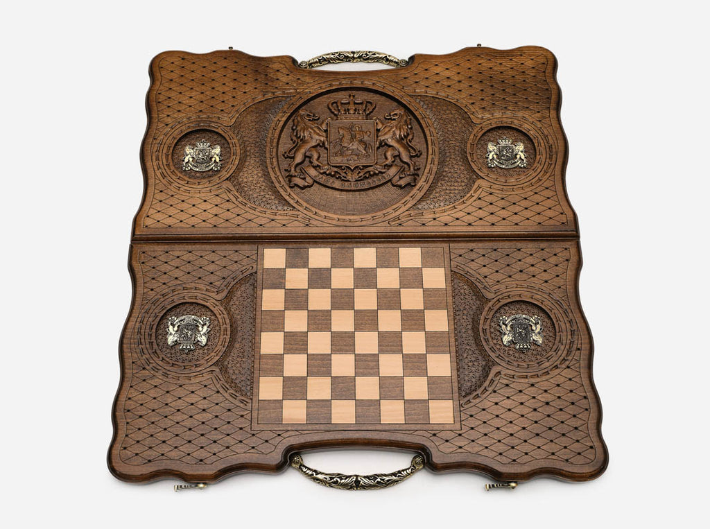 The ornate bronze carry handle
