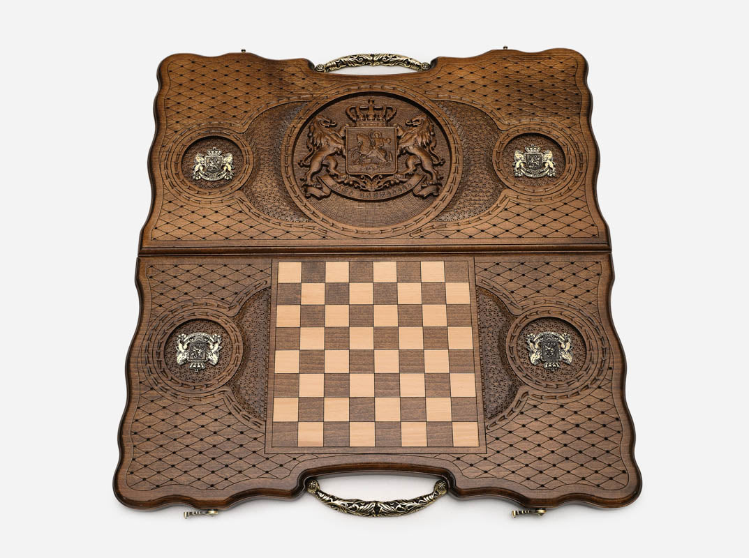 The ornate bronze carry handle