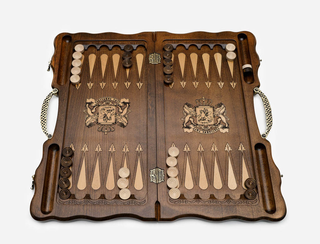 Angled view of the Georgian coat of arms bronze carved backgammon board