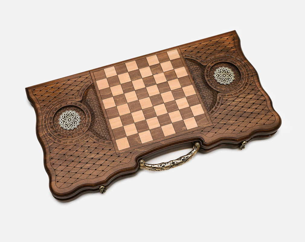 The backgammon board opened to show the wooden playing surface