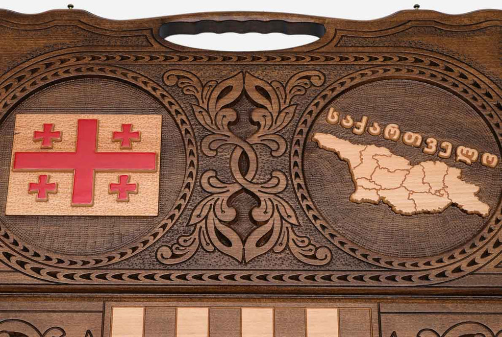 Angled view of the Georgia flag and map carved backgammon board