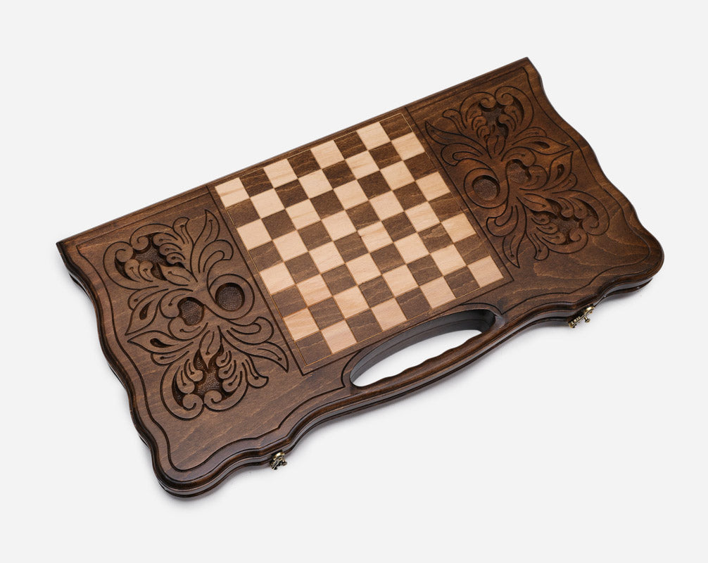 The backgammon board opened to show the wooden playing surface