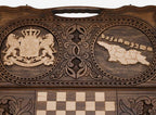 Angled view of the Georgia coat of arms and map carved backgammon board