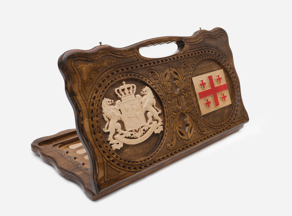 Carved beechwood backgammon board with the Georgian coat of arms and flag, with a carry handle, propped open