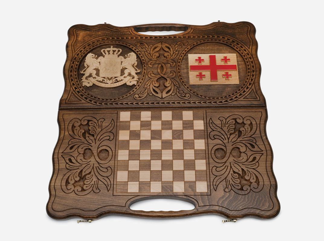 Angled view of the Georgia coat of arms and flag carved backgammon board