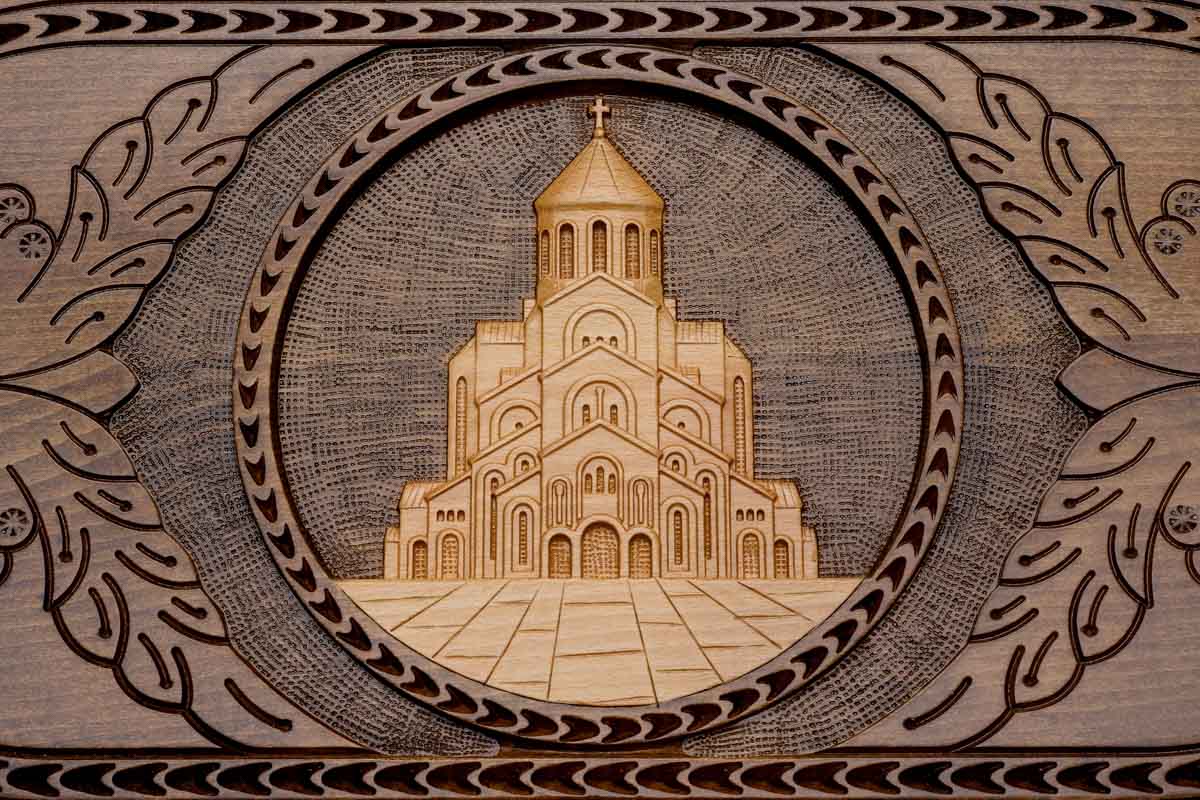 Detail of the scrollwork beside the medallion