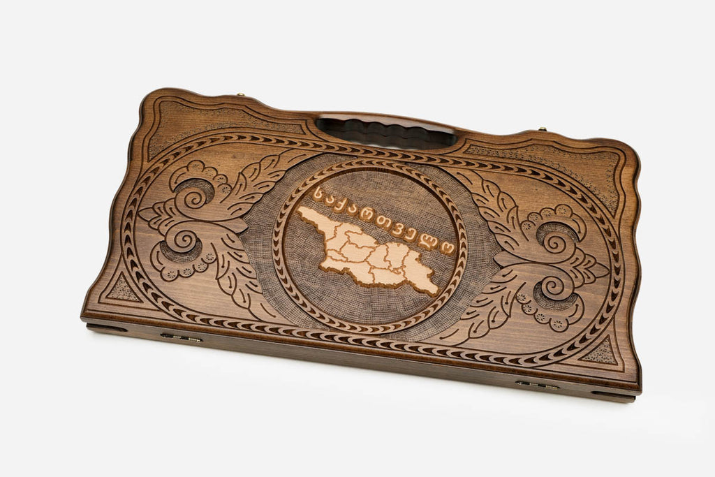 Angled view of the Georgian map carved backgammon board