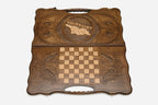 The backgammon board opened to show the wooden playing surface