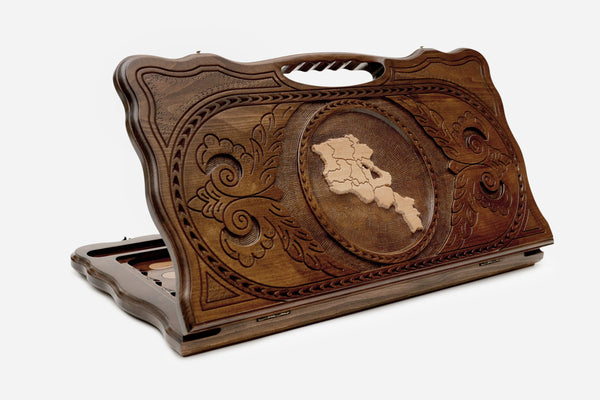 Carved beechwood backgammon board with the map of Armenia and a carry handle, propped open