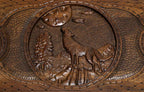 The backgammon board opened to show the wooden playing surface