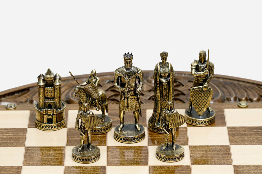 Close-up of the gold-brass Crusader king, queen and mounted knights