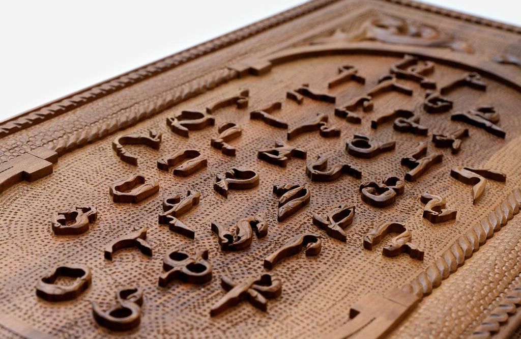The backgammon board opened to show the wooden playing surface