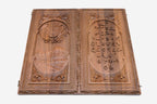 Detail of the alphabet relief and scrollwork border