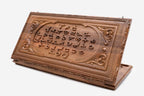 Master-carved walnut backgammon board with the full Armenian alphabet in relief, shown propped open