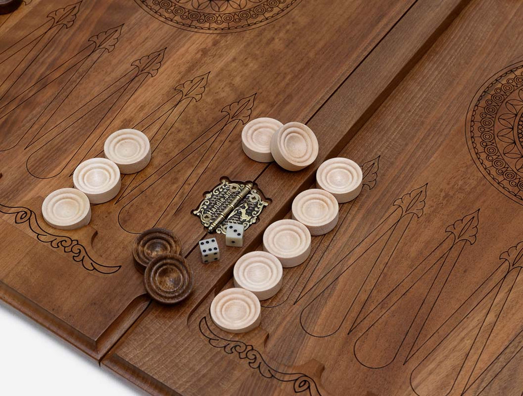 Close-up of the deep walnut carving
