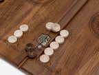 Close-up of the deep walnut carving