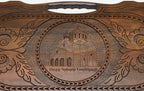 The backgammon board opened to show the wooden playing surface