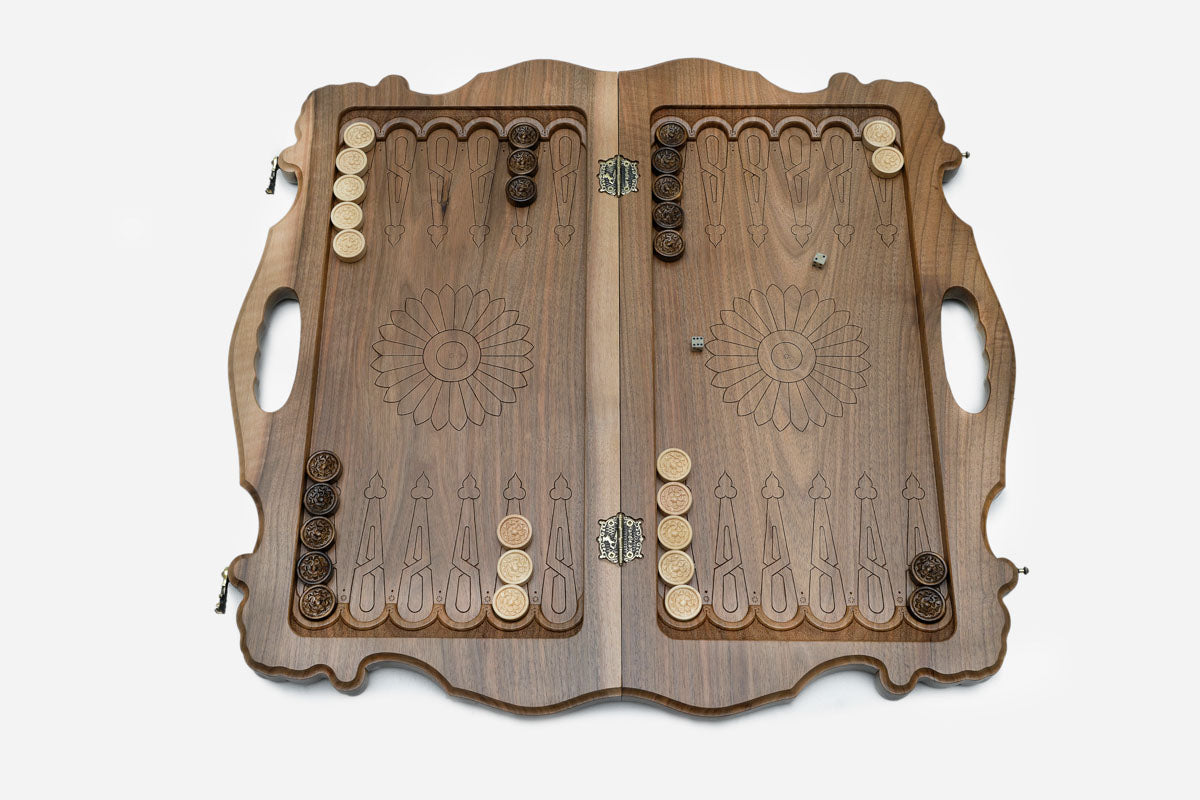 Side view of the ornate walnut board