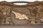The backgammon board opened to show the wooden playing surface