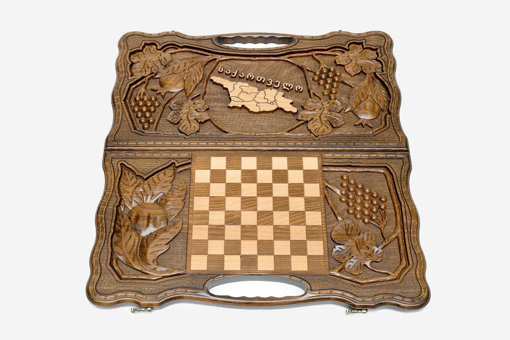 Close-up of the carved map of Georgia in pale wood