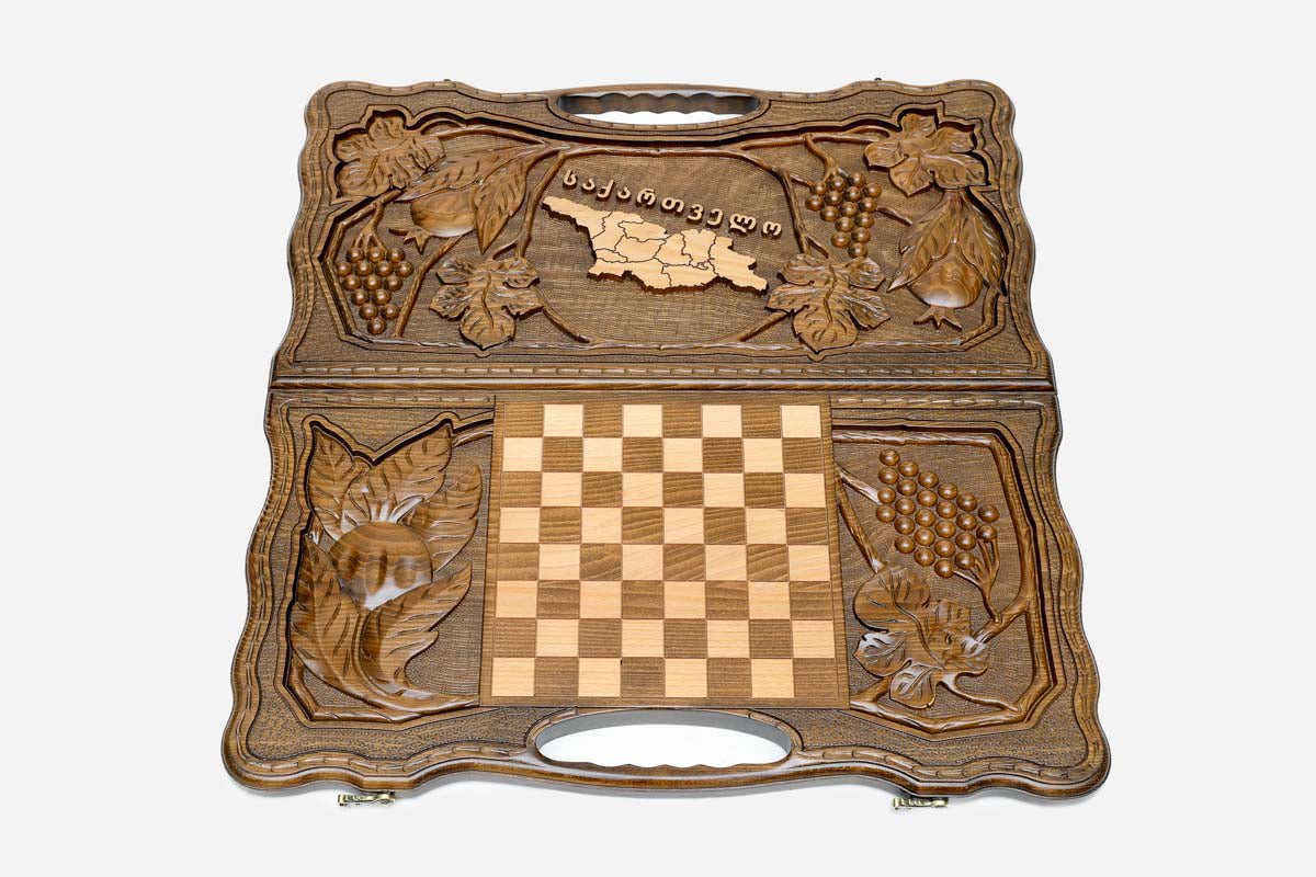 Close-up of the carved map of Georgia in pale wood