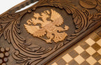 The backgammon board opened to show the wooden playing surface