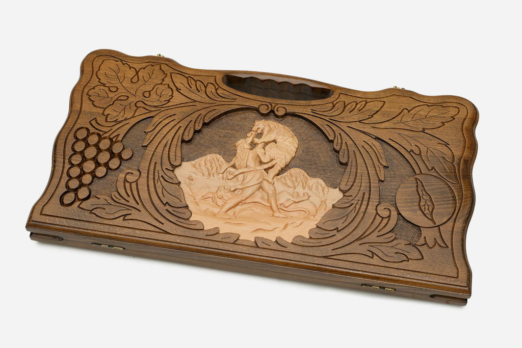 Angled view of the Samson and the lion carved backgammon board